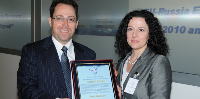 Dr. Sean Costigan presents the 2010 Athena Award to Ms Irena Dimitrova